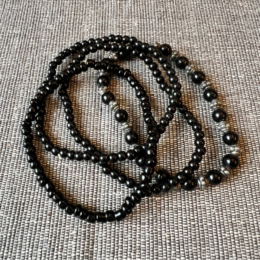 Elegant Black Beaded Four Piece Bracelet Set with Pewter Spacers